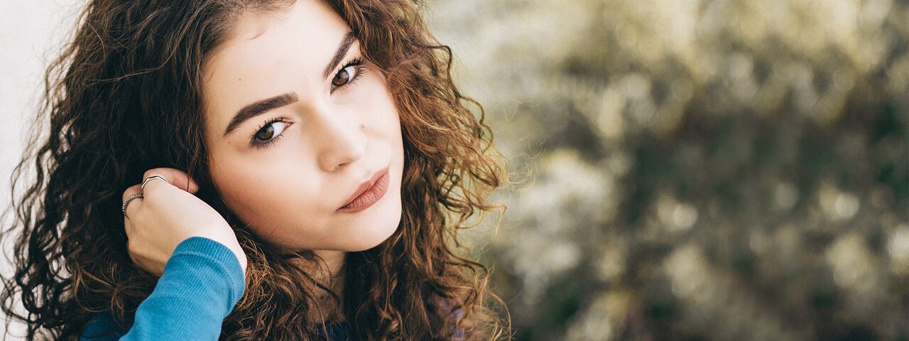 Eye care, girl brown eyes, wearing contact lenses in North Vancouver, BC